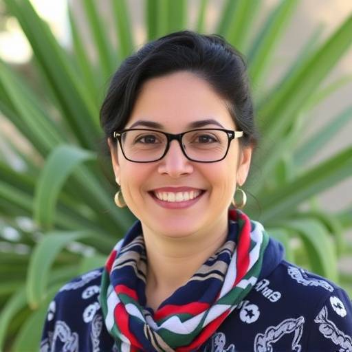 A portrait of Maria Garcia, the Education Coordinator at Aurora Arts Collective.